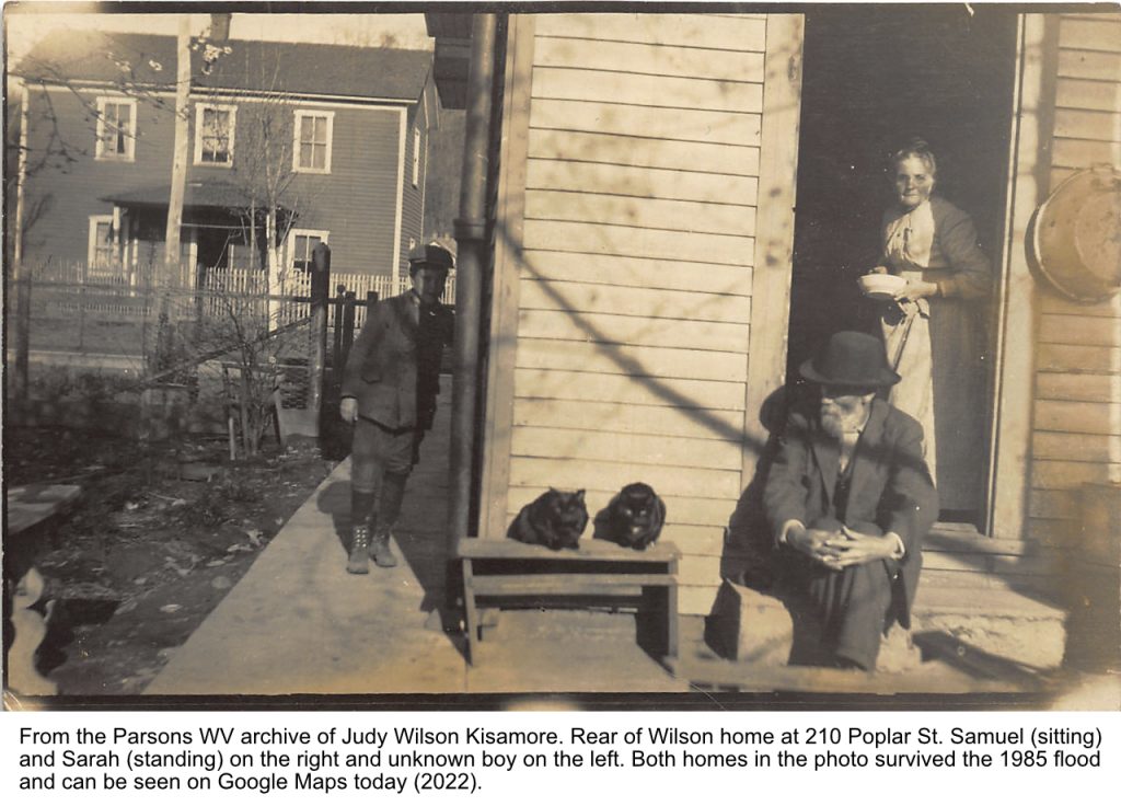 Samuel and Sarah at the rear door of their home at 210 Poplar